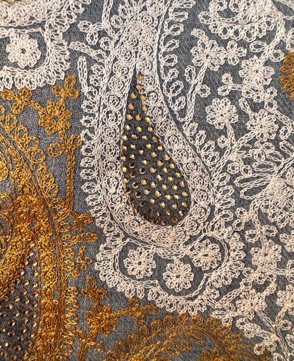 Handcrafted Niche by SWAL pashmina shawl in soft beige with subtle Kashmiri embroidery, complementing Eid dresses Pakistani.