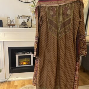 Back view of a khaki 3 piece suit with intricate embroidery and a silk dupatta.