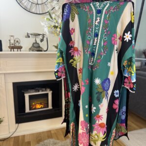 Back view of a green 3 piece suit with floral embroidery and a dupatta